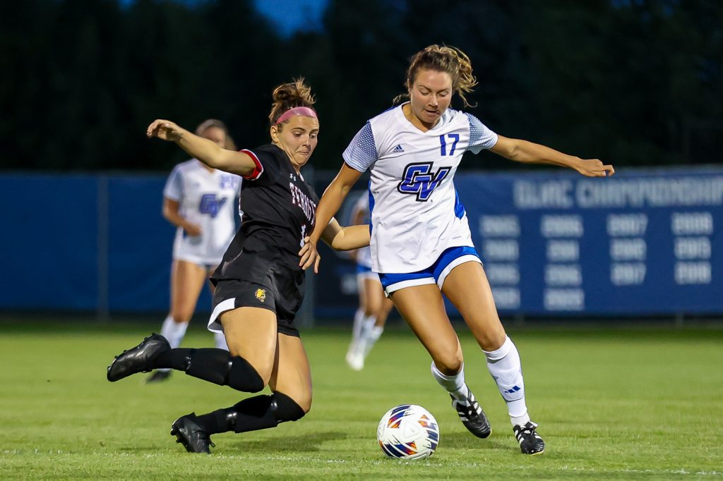 Ferris player attempts to intercept ball from Grand Valley player