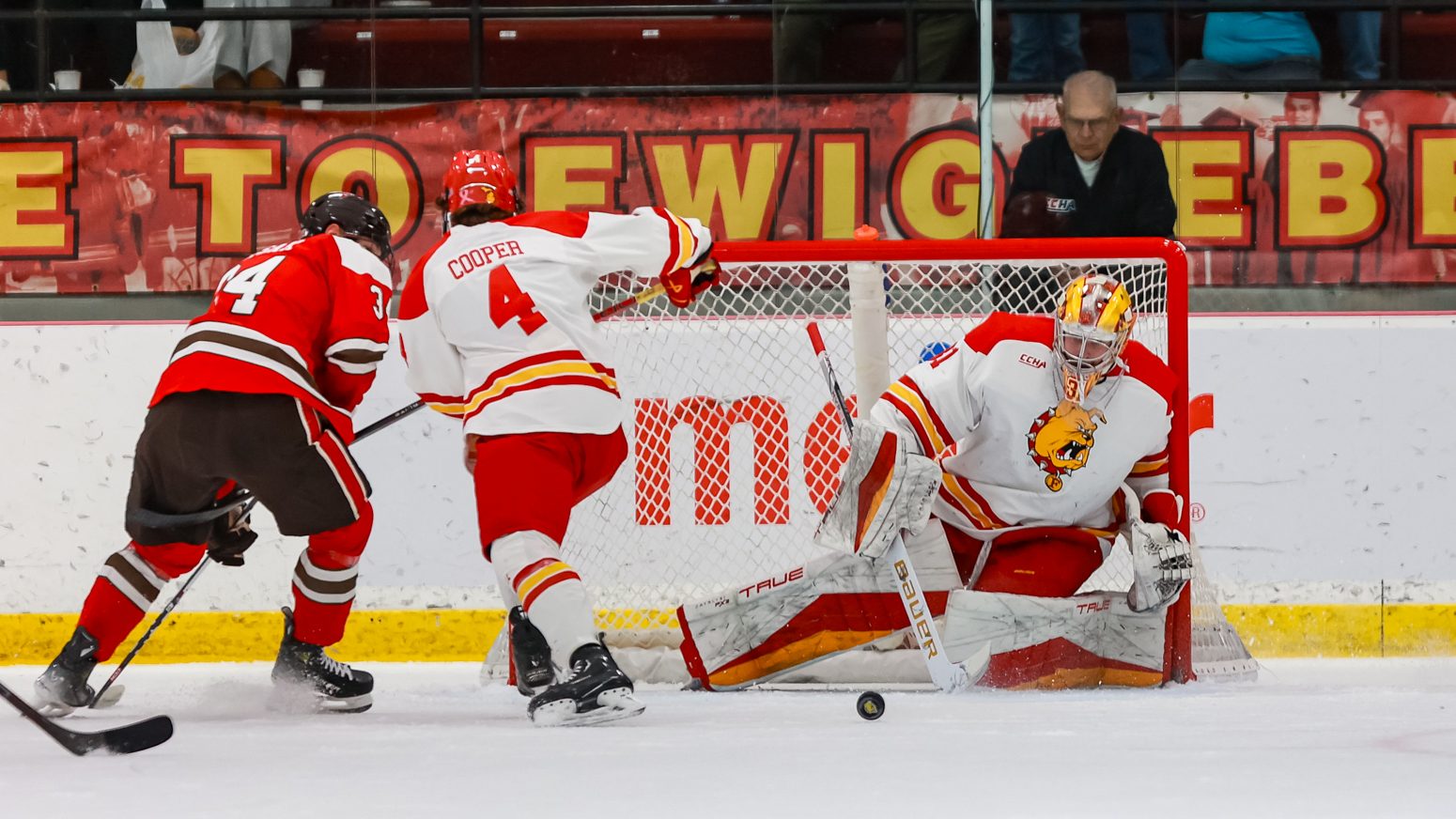 Ferris goalie blocks puck 